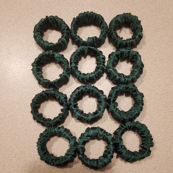 Other - Vintage fabric over plastic Rings napkin rings.12 count.